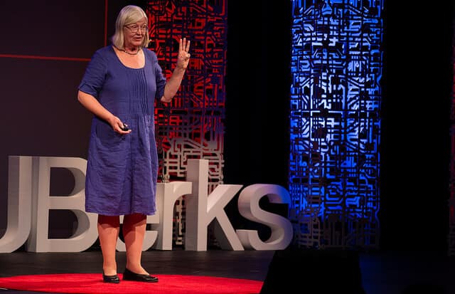DrAnnika-TEDxPSUBerks-corporate-speaker Corporate speaker Dr. Annika speaking on TEDxPSUBerks stage about stress management and leadership